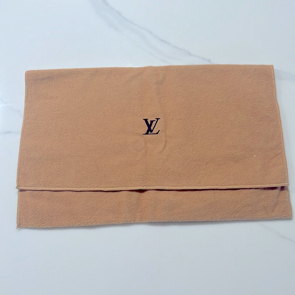 Vintage Small Louis Vuitton flip dustbag. Perfect for wallets or small bags.…